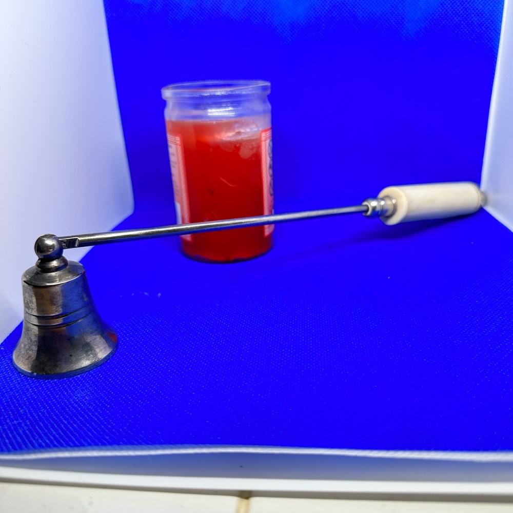 Silver with possible Bakelite handle candle snuffer